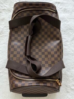 Louis Vuitton travel luggage  bag with rolling wheels Authentic Retail 3800$